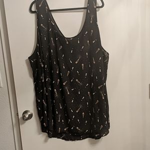 Torrid size 6 black cami with champagne bottle pri